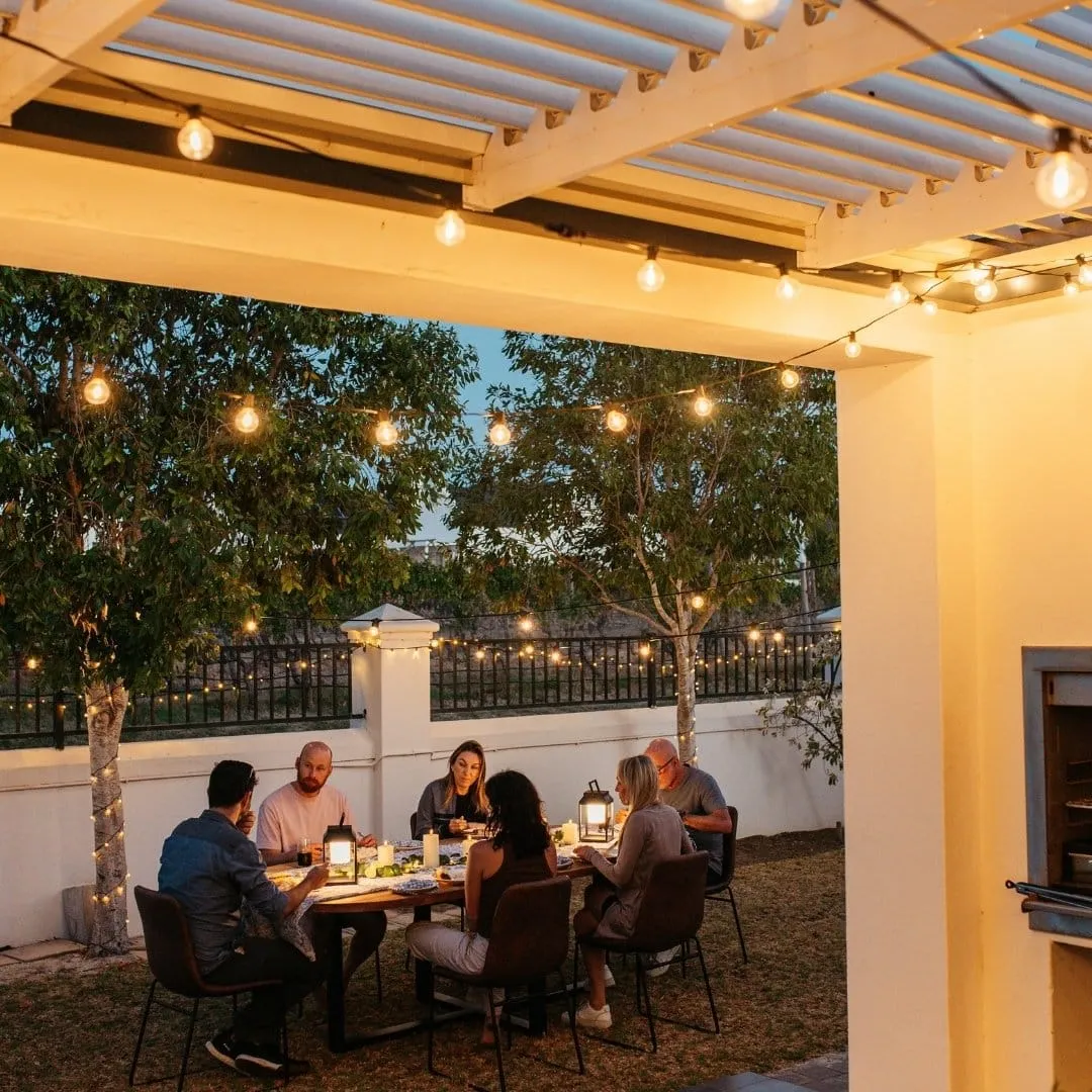 Outdoor string lights over a patio setting